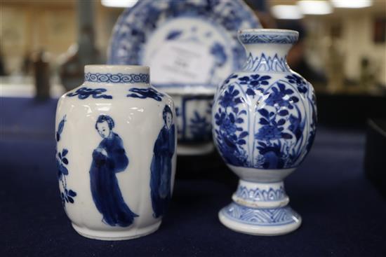 A Chinese blue and white tea bowl and saucer and two jars, Kangxi, some damage, largest diameter 11cm
